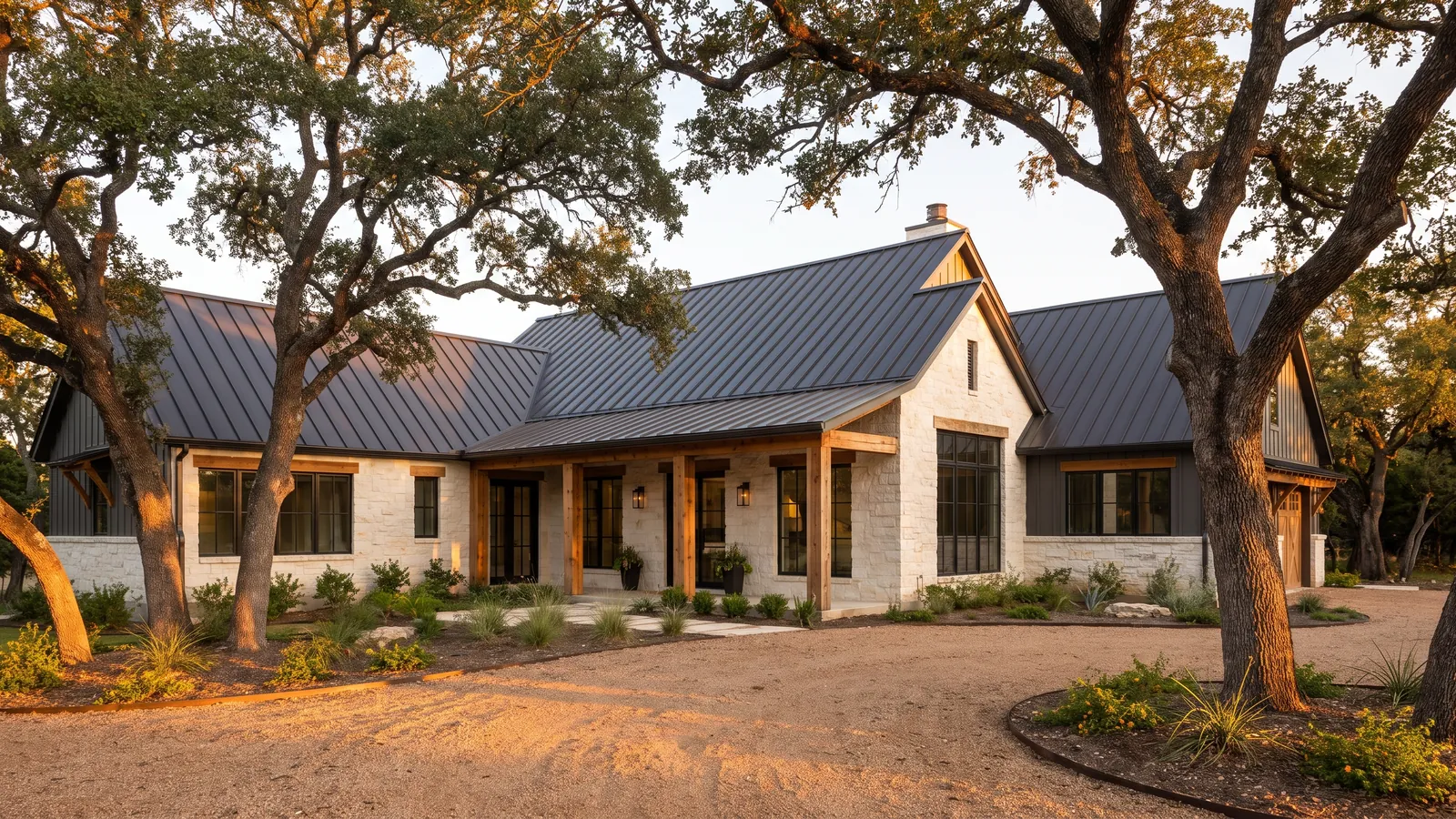 Standing-seam metal roof on a limestone and cedar Hill Country home near New Braunfels
